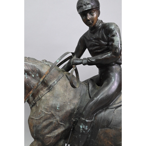 1205 - After Pierre Jules Menes, a patinated bronze sculpture of a mounted jockey, raised on a naturalistic... 