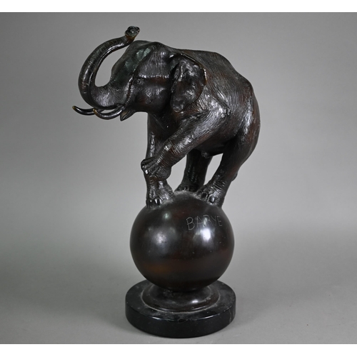 1206 - A cast patinated dark bronze sculpture after A Barye, a trumpeting elephant raised on a globe - on a... 