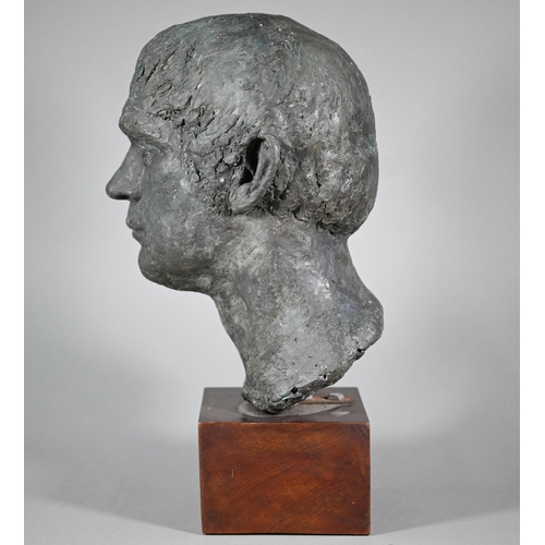 1208 - Pamela De Ville, a patinated pottery male bust, raised on a woodblock mount, 44 cm h 