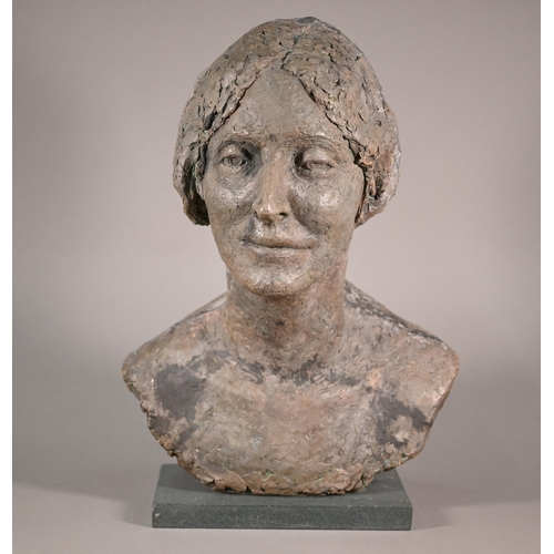 1209 - Pamela De Ville, 'Dee', a patinated clay bust of a woman, raised on a woodblock base, 42 cm h o/all