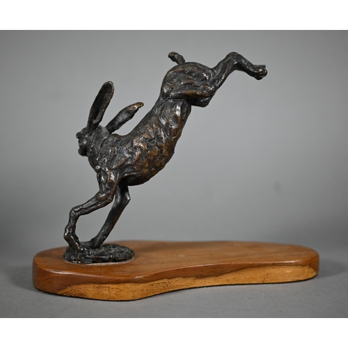 1215 - Two brown bronze sculptures of hares, one running, one leaping, both on yew wood bases, 15 cm and 13... 