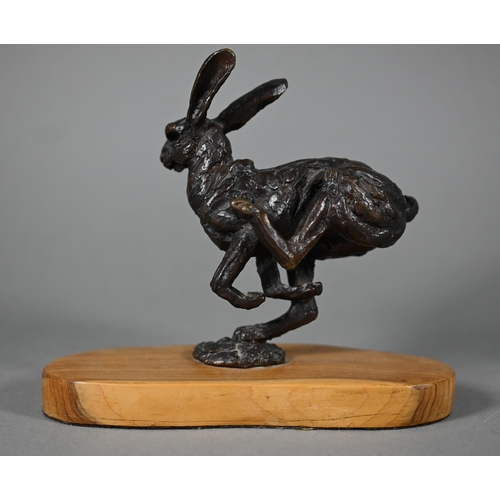 1215 - Two brown bronze sculptures of hares, one running, one leaping, both on yew wood bases, 15 cm and 13... 