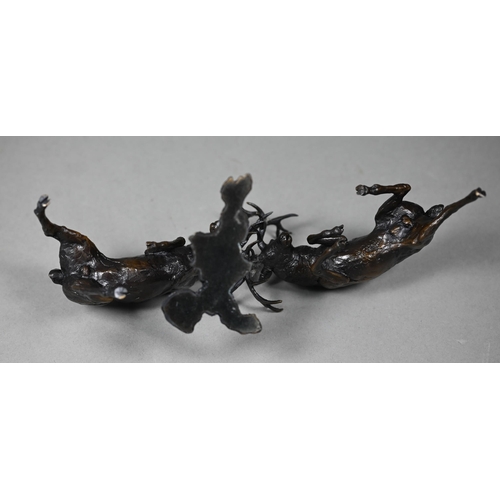 1216 - A brown bronze sculpture of battling stags, antlers locked together, 11 cm h x 24 cm long