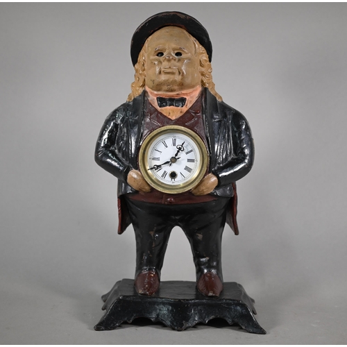 1218 - A reproduction cast iron novelty clock, the eyes moving on the pendulum swing of the 8-day movement,... 