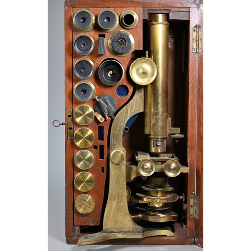 1220 - An antique brass binocular microscope by Henry Crouch, London Wall, no 461, in fitted mahogany case ... 