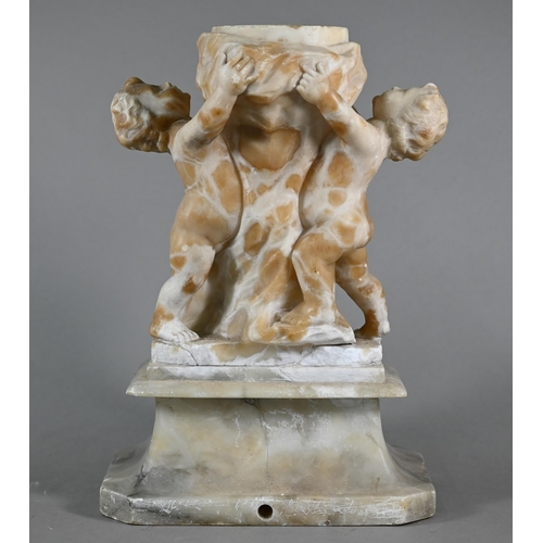 1227 - An antique Italianate carved alabaster urn supported by three putti, 34 cm