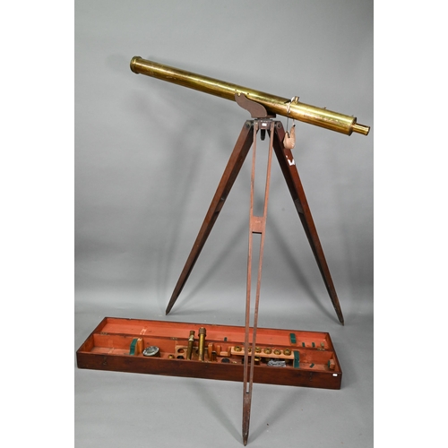 1234 - Dolland, London, a late 19th century brass tube telescope, raised on a folding wooden tripod stand -... 