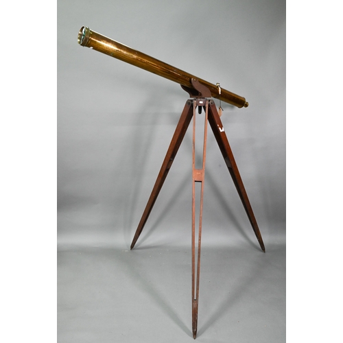 1234 - Dolland, London, a late 19th century brass tube telescope, raised on a folding wooden tripod stand -... 