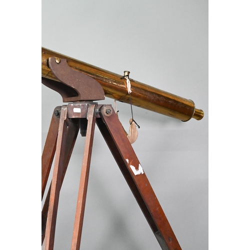 1234 - Dolland, London, a late 19th century brass tube telescope, raised on a folding wooden tripod stand -... 