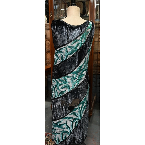 1139 - A 1920s beaded and sequin evening dress in black, white and aqua striped panels