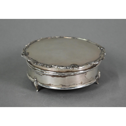 30A - A circular silver ring-box with hinged over, Birmingham 1927, 9cm diameter