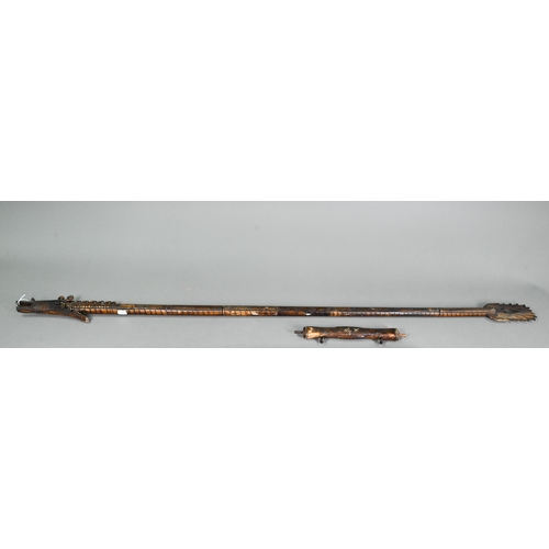 525 - Indonesian sectional stained and carved bone 'dragon' blow-pipe, 140cm, to/w a companion quiver for ... 