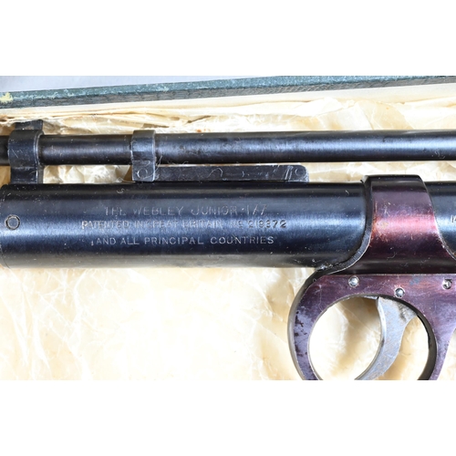 1070 - A vintage boxed Webley Scott 'Junior' air pistol to/w a 'Daisy' pop-gun (2)Purchasers must be 18 and... 