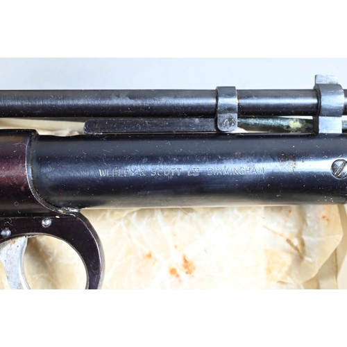 1070 - A vintage boxed Webley Scott 'Junior' air pistol to/w a 'Daisy' pop-gun (2)Purchasers must be 18 and... 