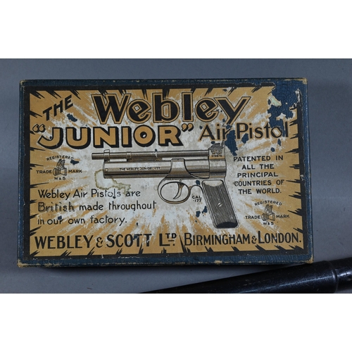 1070 - A vintage boxed Webley Scott 'Junior' air pistol to/w a 'Daisy' pop-gun (2)Purchasers must be 18 and... 