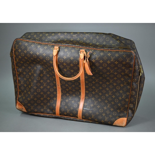 1140 - Louis Vuitton - A canvas suitcase travel bag with leather trimmings, serial number SP0977