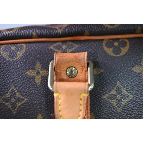 1140 - Louis Vuitton - A canvas suitcase travel bag with leather trimmings, serial number SP0977