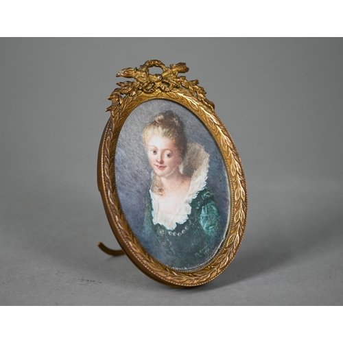 1158 - An early 20th century oval portrait miniature on ivory of a young lady in 17th century costume, sign... 