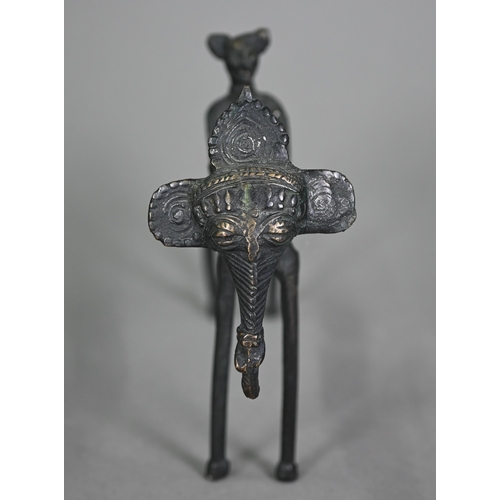 1169 - An African tribal bronze group of a jackal-headed figure with drum, riding an elephant, 16 x 24 cm&n... 