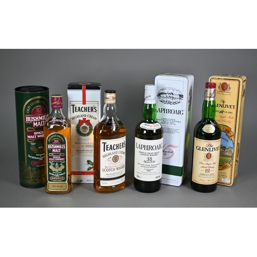 1175 - Three boxed/tinned bottles of single malt whisky - Laphroaig (Isle of Islay), The Glenlivet (St Andr... 