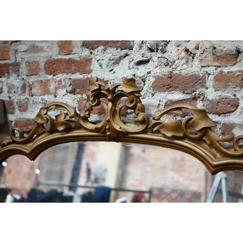 954 - A large late 19th century giltwood and composite over-mantel mirror, with scroll leaf surmount, appr... 