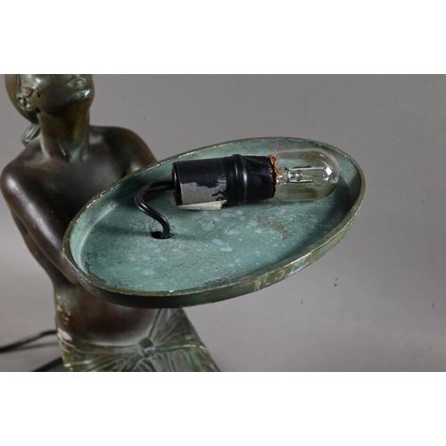 958 - An Art Deco Verdigris patinated bronze table lamp, modelled as a kneeling woman with bowl of fruit, ... 