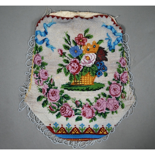 1120 - A 19th century glass beadwork pouch decorated with a basket of flowers to one side, and a butterfly ... 