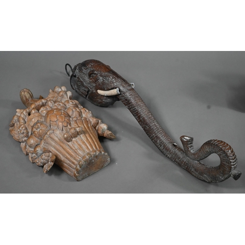 1228 - A 19th century brass lion-paw doorstop with foliate loop handle, 39 cm high