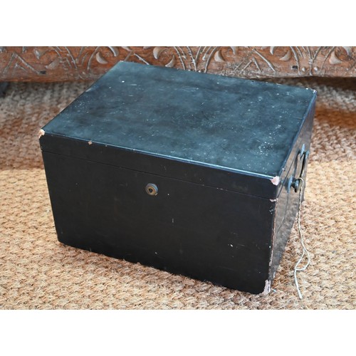 532 - An early 19th century Chinese black lacquer rectangular tea chest with brass handles, the hinged cov... 