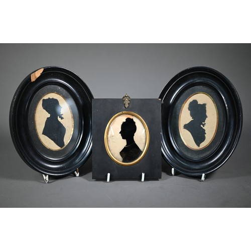 1107 - A Regency silhouette of a gentleman, by Miers & Field, 111 The Strand, London, 8 x 6.5 cm, in eb... 