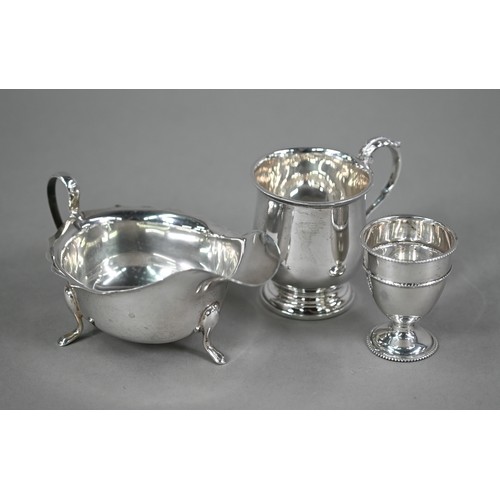 159 - A silver sauce-boat, Viners, Sheffield 1939, to/w Christening mug, Birmingham 1954 and an egg-cup, L... 