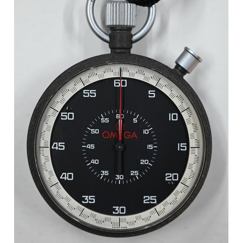 412 - A contemporary Omega stopwatch, 63 mm dia, on braided cord neck strap