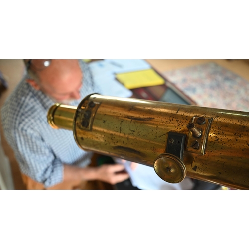 1234 - Dolland, London, a late 19th century brass tube telescope, raised on a folding wooden tripod stand -... 