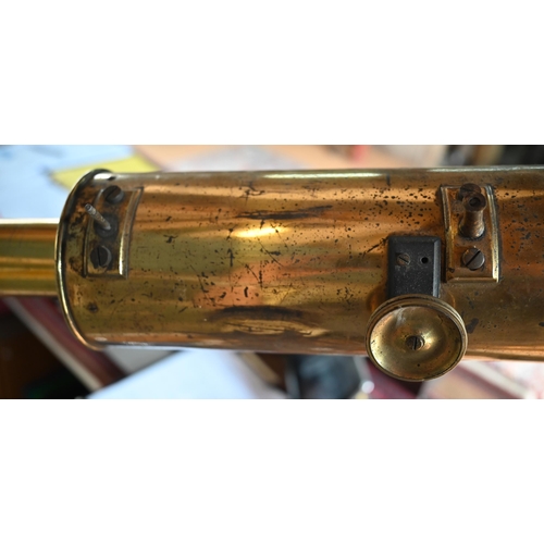 1234 - Dolland, London, a late 19th century brass tube telescope, raised on a folding wooden tripod stand -... 