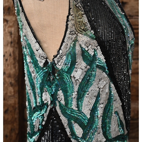 1139 - A 1920s beaded and sequin evening dress in black, white and aqua striped panels