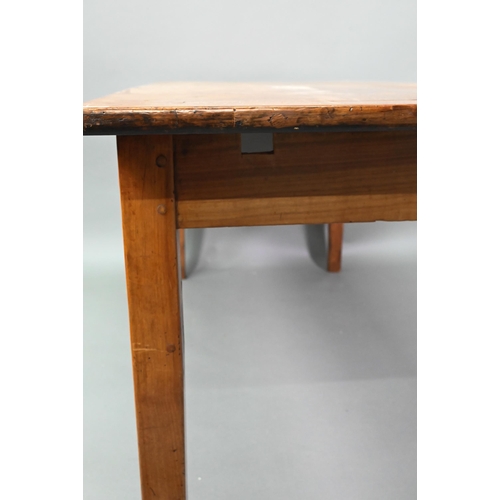 541 - An antique French cherry wood farmhouse table, the plank top with cleated ends and later draw leaf e... 