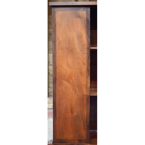 325 - A reproduction mahogany veneered revolving bookcase, 51 cm x 51 cm x 94 cm h