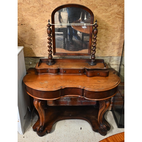 469 - # A Victorian serpentine form mirror backed dressing table