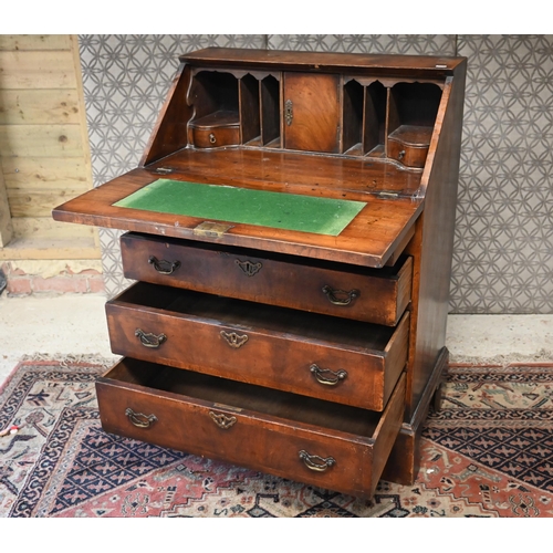 501 - Mahogany fall front bureau with four long graduating drawers on tall bracket feet, 72 cm w x 42 cm d... 