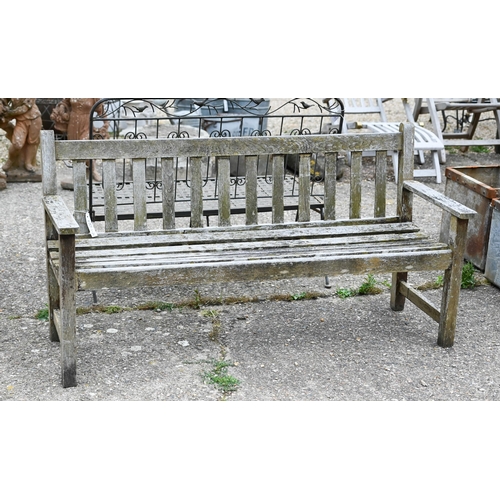 12 - A weathered teak garden bench, 155 cm wide