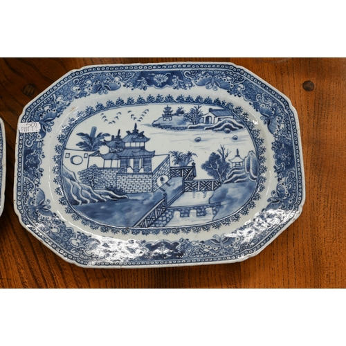 156 - A pair of 19th century Chinese blue and white dishes, painted with ornamental lake landscapes, 31 x ... 