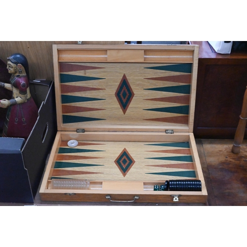 232 - An inlaid oak backgammon board with composite counters, to/w a cast iron portable hand-warmer, a pai... 