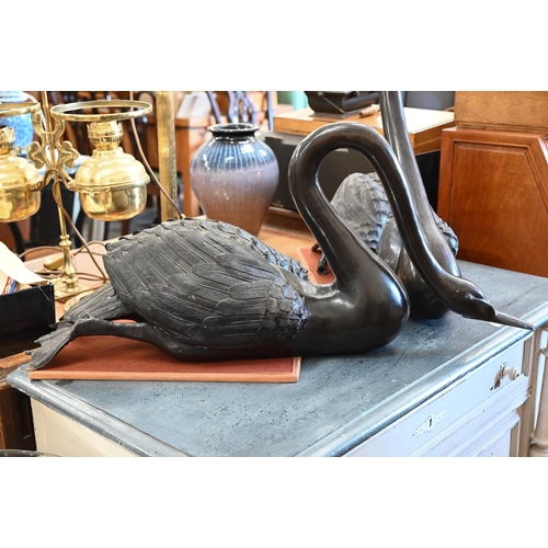 237 - Two large bronze swans, 63 cm high max.