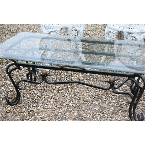 24 - # A glass top steel framed coffee table to/w a pair of Victorian style cast alloy garden chairs (3)... 