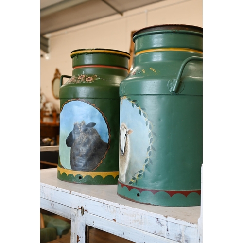 240 - A companion pair of polychrome painted milk churns with portraits of sheep by Thordil Aslong (2)