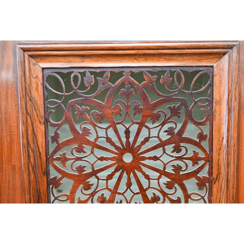 329 - A mahogany cabinet with floral and foliate design fret-cut door over single drawer, 60 cm wide x 46 ... 