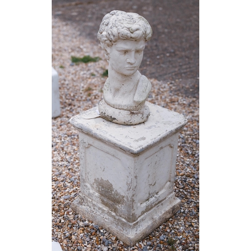 33 - A cast stone Roman style bust on an associated square plinth - both patinated (2)