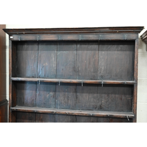 330 - A small antique oak cottage dresser with two shelves over two drawers and slatted pot board undertie... 