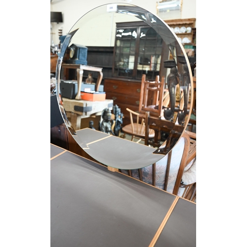 336 - A modern light oak dressing table with bevelled circular mirror on splayed turned supports, 100 cm w... 