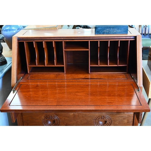 337 - A Chinese hardwood four drawer fall front bureau carved with Shou symbols, 92 cm wide x 40 cm deep x... 